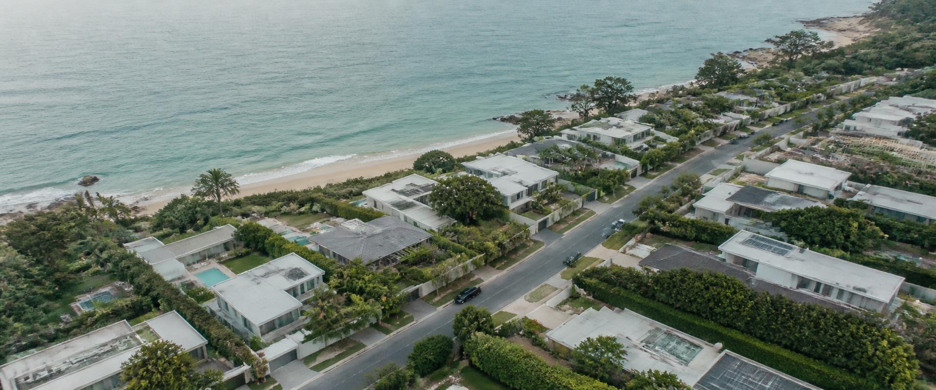Aerial view of a coastal neighborhood of modern homes